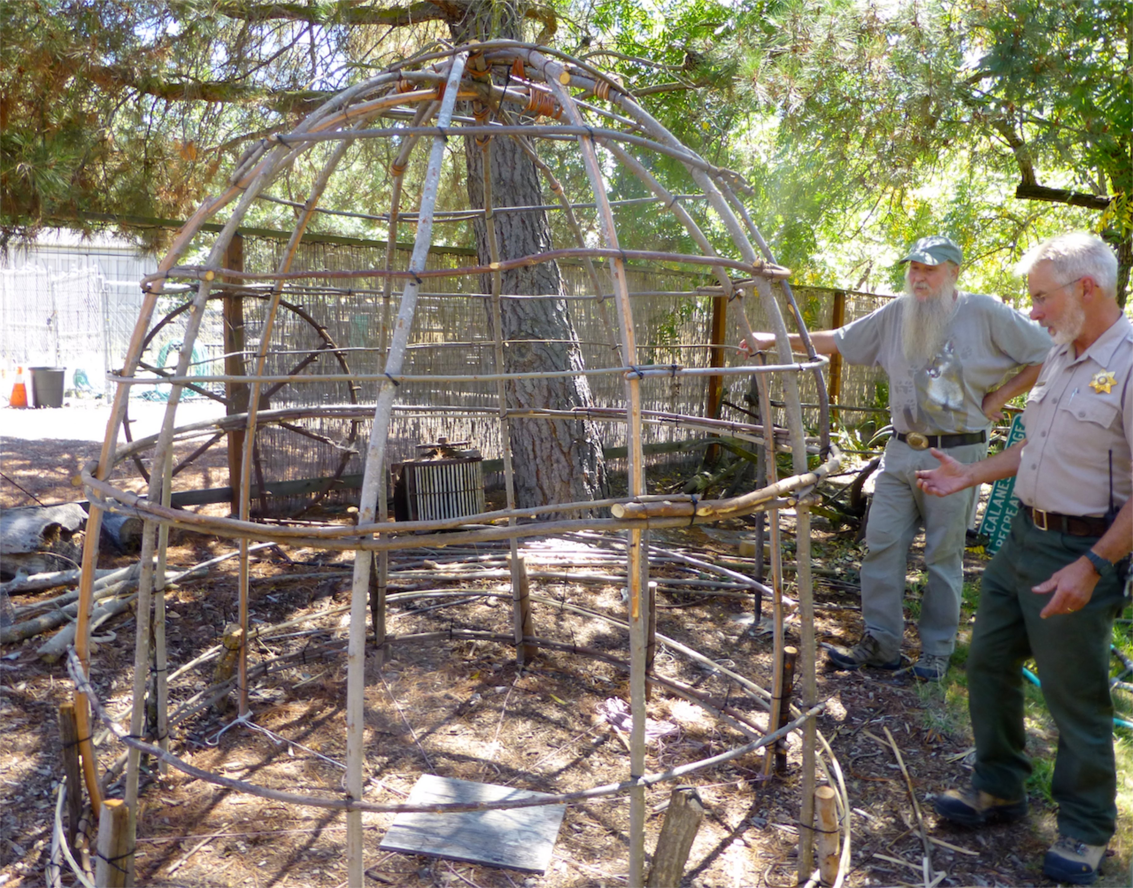 Ranger Bruce Weidman (right) and Doc Hale build a Miwok dwelling at Sugarloaf Open Space